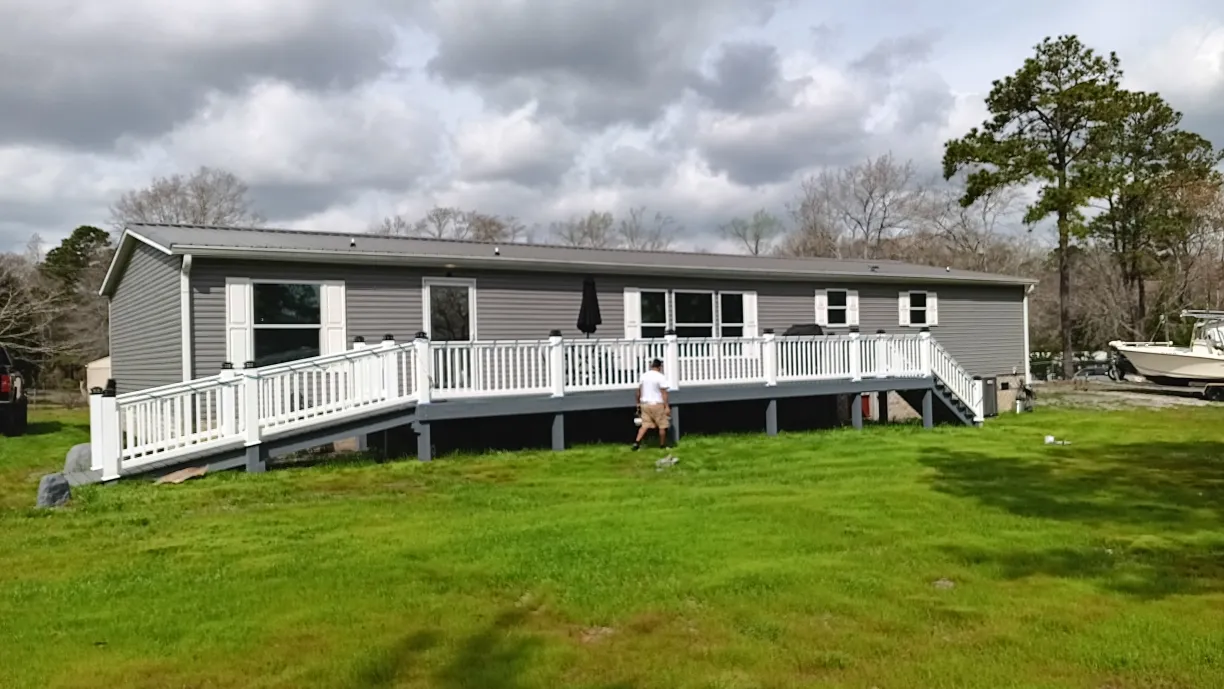 Custom deck ramp construction and painting in Southport, NC - elevated outdoor access